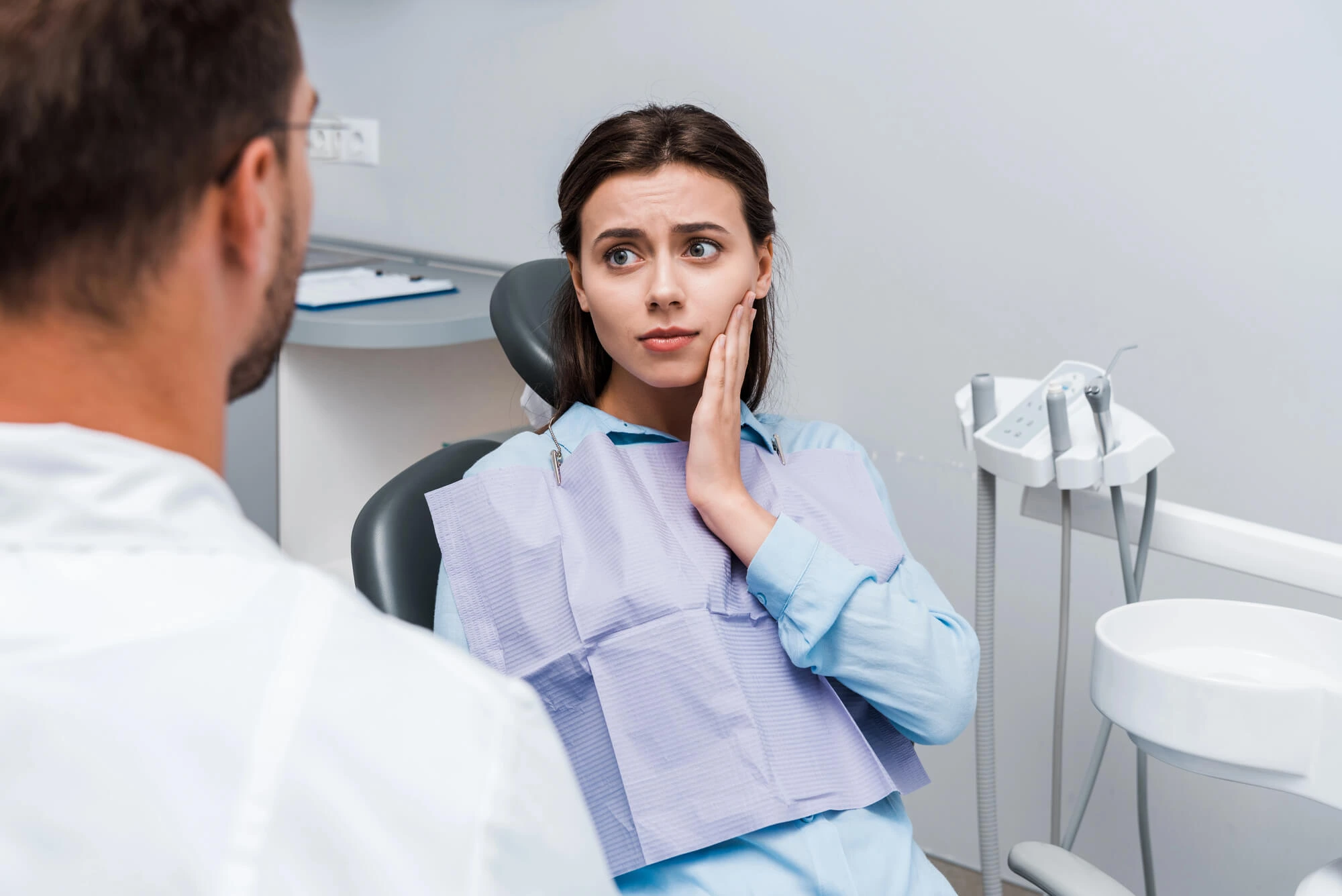 Woman Needing Laser Periodontal Therapy in NYC